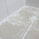floor tiles set with pre-mixed grout