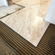 floor tile installation with sound insulation adhesive